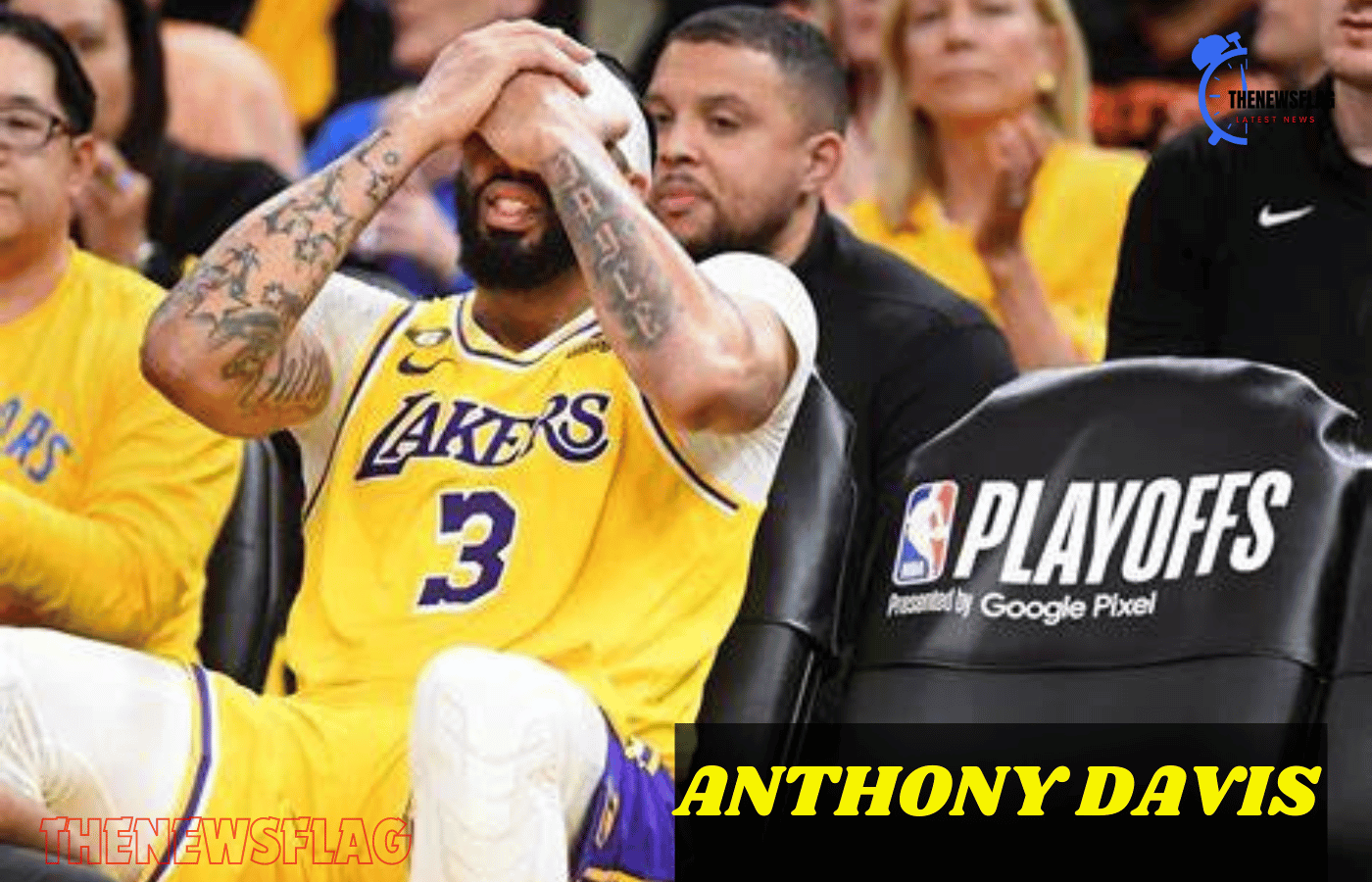 Anthony Davis of the Lakers is injured in the first quarter of the game against the Warriors.
